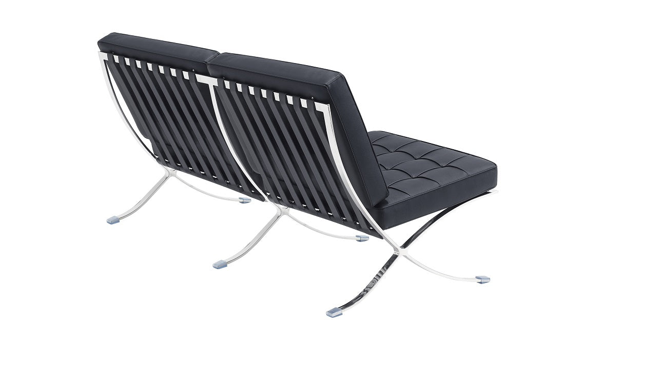 Design fauteuil met halfleren voetenbank Barna